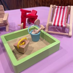 Outdoor summer play set. Not calico critters but my kids used it with them